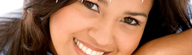 photo of people with wonderful smiles thanks to the smile design center